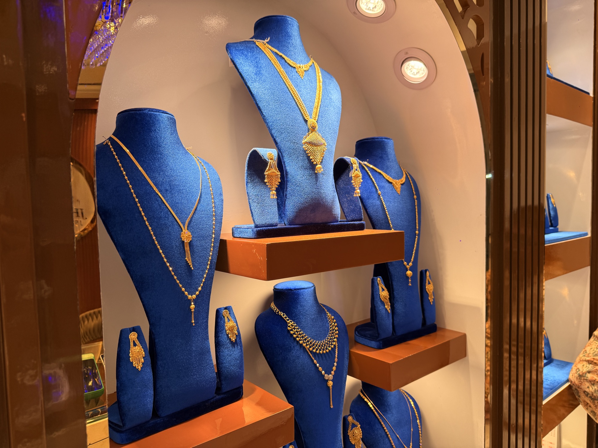 Evening photograph of the necklace alcove at Jhuma Jewellers.